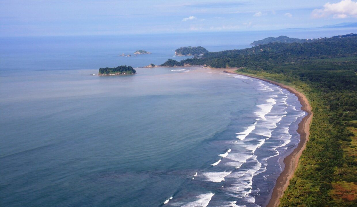 White-sand beach point with an offshore island, South Pacific Costa Rica